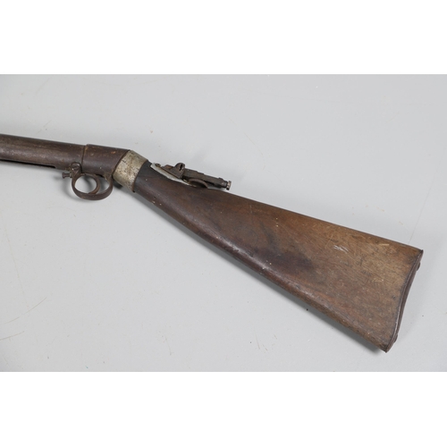 58 - AN EARLY BSA IMPROVED MODEL D 0.177 AIR RIFLE. The 49 cm barrel numbered 27143 with under lever cock... 