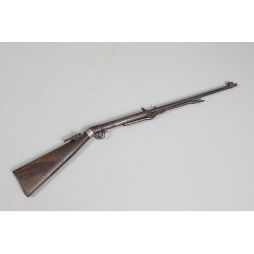 58 - AN EARLY BSA IMPROVED MODEL D 0.177 AIR RIFLE. The 49 cm barrel numbered 27143 with under lever cock... 