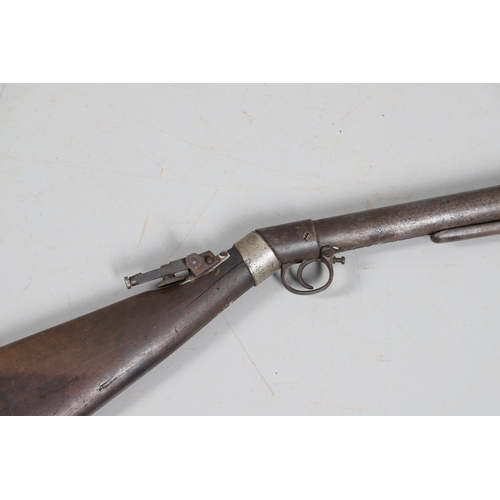 58 - AN EARLY BSA IMPROVED MODEL D 0.177 AIR RIFLE. The 49 cm barrel numbered 27143 with under lever cock... 