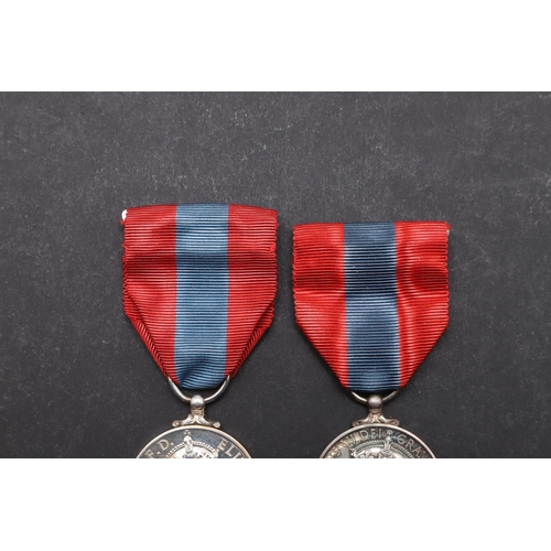 582 - A GEORGE VI IMPERIAL SERVICE MEDAL AND SIMILAR ELIZABETH II MEDAL. A George VI Imperial Service Meda... 