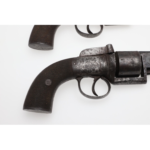 7 - AN UNUSUAL PAIR OF MID 19TH CENTURY 80 BORE TRANSITIONAL REVOLVERS. With 11.5cm octagonal barrels, m... 