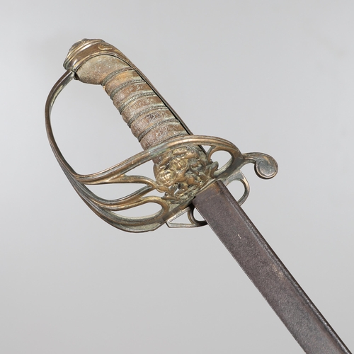 84 - AN EAST INDIA COMPANY OFFICER'S 1822 PATTERN SWORD. With an 81 cm pipe backed blade, brass hilt with... 