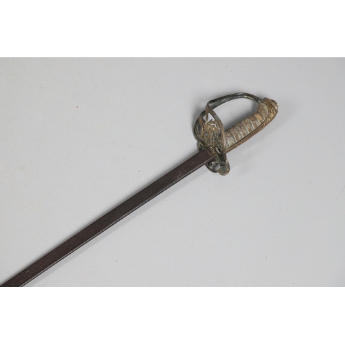 84 - AN EAST INDIA COMPANY OFFICER'S 1822 PATTERN SWORD. With an 81 cm pipe backed blade, brass hilt with... 