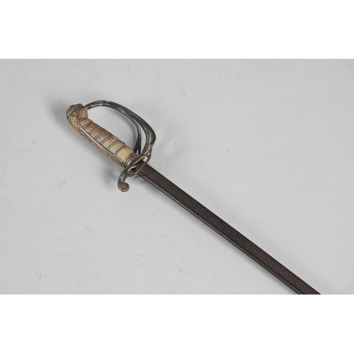 84 - AN EAST INDIA COMPANY OFFICER'S 1822 PATTERN SWORD. With an 81 cm pipe backed blade, brass hilt with... 