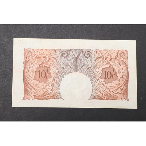 589 - A BANK OF ENGLAND SERIES 'A' TEN SHILLING NOTE. A Series 'A' Britannia issue ten shilling note numbe... 