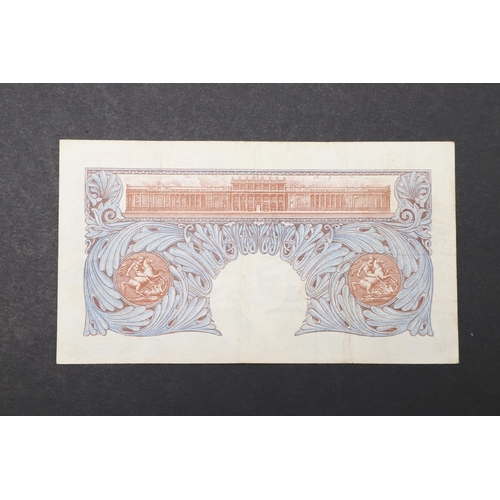 594 - A BANK OF ENGLAND SERIES 'A' ONE POUND NOTE. A Series 'A' Britannia blue issue one pound note number... 