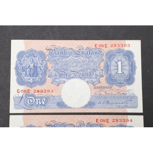 598 - TWO BANK OF ENGLAND SERIES 'A' BLUE ONE POUND NOTES WITH CONSECUTIVE NUMBERS. Two series 'A' Britann... 