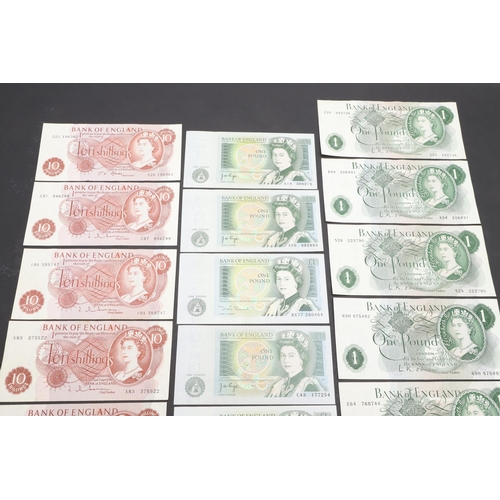 607 - A COLLECTION OF BANK OF ENGLAND ONE POUND AND TEN SHILLING NOTES. A collection of notes comprising s... 