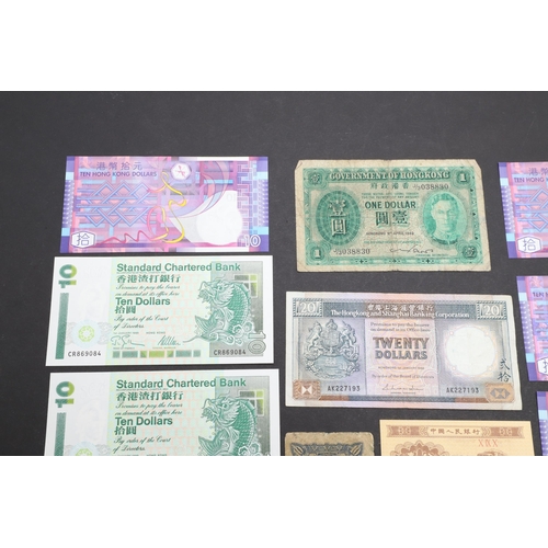 615 - A COLLECTION OF THIRTEEN CHINESE BANKNOTES. A collection of Chinese banknotes to include Hong Kong a... 