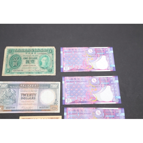 615 - A COLLECTION OF THIRTEEN CHINESE BANKNOTES. A collection of Chinese banknotes to include Hong Kong a... 