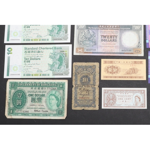 615 - A COLLECTION OF THIRTEEN CHINESE BANKNOTES. A collection of Chinese banknotes to include Hong Kong a... 