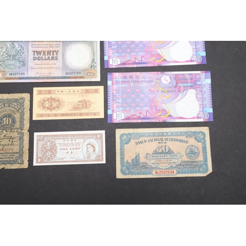 615 - A COLLECTION OF THIRTEEN CHINESE BANKNOTES. A collection of Chinese banknotes to include Hong Kong a... 