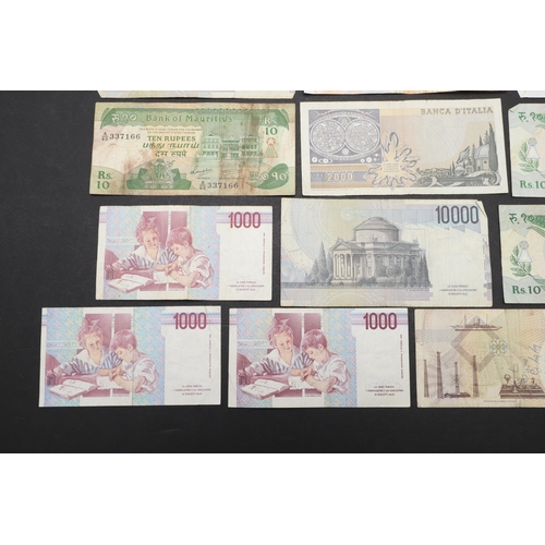 617 - A COLLECTION OF TWENTY FOUR VARIOUS WORLD BANKNOTES. A mixed collection of World banknotes to includ... 