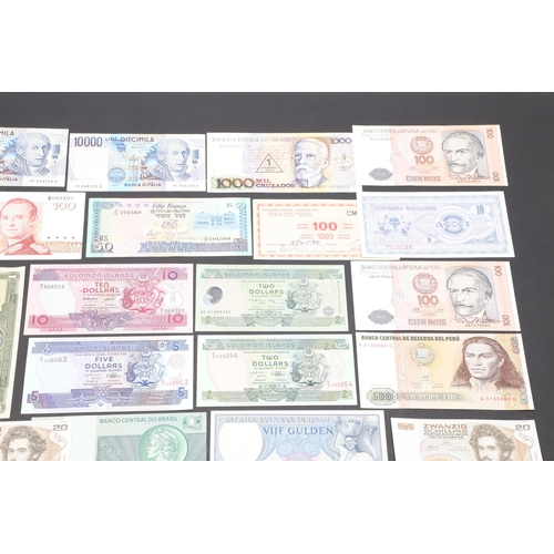 618 - A COLLECTION OF WORLD BANKNOTES FROM VARIOUS COUNTRIES. A collection of notes from Indonesia, Peru, ... 