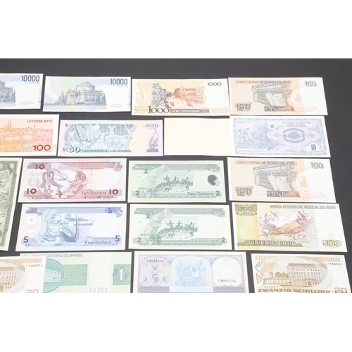 618 - A COLLECTION OF WORLD BANKNOTES FROM VARIOUS COUNTRIES. A collection of notes from Indonesia, Peru, ... 