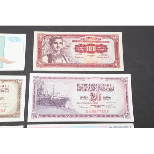 619 - A COLLECTION OF EIGHT YUGOSLAVIAN BANKNOTES. A collection of Yugoslavian banknotes from 100000, 5000... 