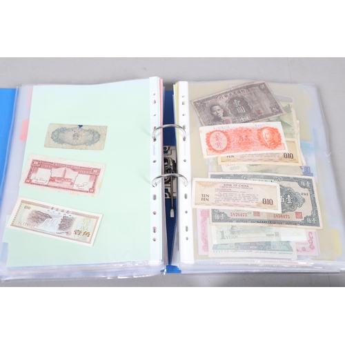 622 - AN EXTENSIVE COLLECTION OF WORLD BANKNOTES. Three albums of World Banknotes, numerous countries to i... 