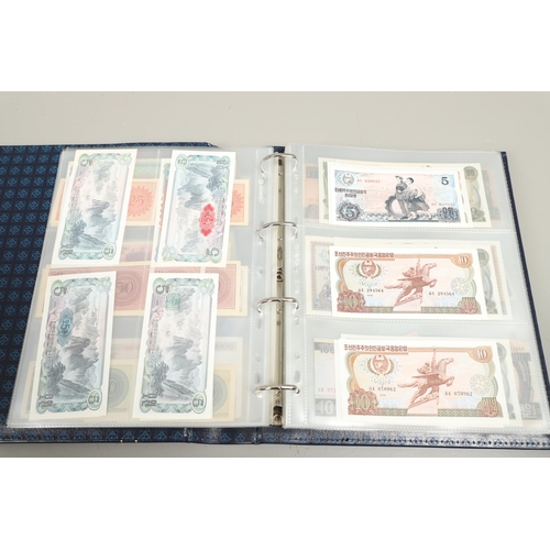 623 - AN ALBUM OF OVER 150 WORLD BANK NOTES TO INCLUDE INDONESIA, IRAQ, CAMBODIA, ISRAEL AND OTHER COUNTRI... 