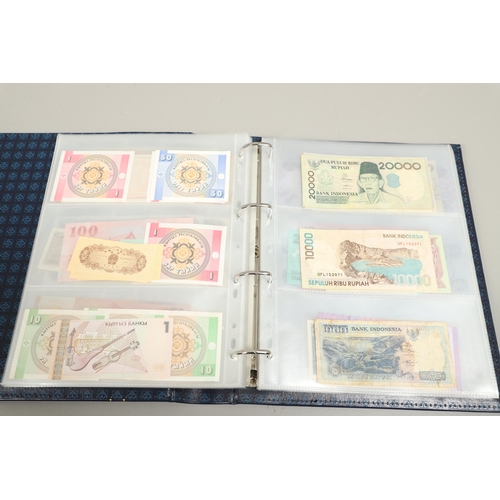 623 - AN ALBUM OF OVER 150 WORLD BANK NOTES TO INCLUDE INDONESIA, IRAQ, CAMBODIA, ISRAEL AND OTHER COUNTRI... 