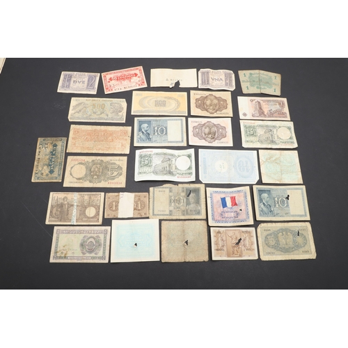 624 - A MIXED COLLECTION OF WORLD BANKNOTES. A collection of World banknotes to include examples from Fran... 