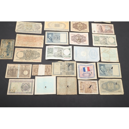 624 - A MIXED COLLECTION OF WORLD BANKNOTES. A collection of World banknotes to include examples from Fran... 