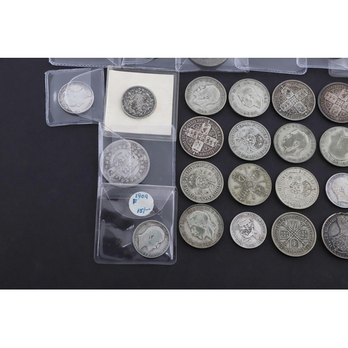 643 - A QUEEN ANNE HALF CROWN, 1708, AND A COLLECTION OF OTHER LATER SILVER COINS. A Queen Anne Halfcrown,... 