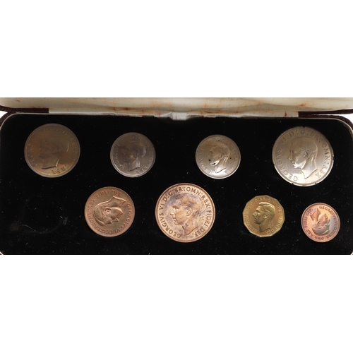 646 - THREE MID 20TH CENTURY SPECIMEN COIN SETS, 1950, 1951 AND 1953. Three specimen coin sets. A George V... 