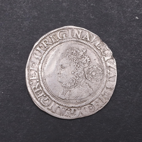 744 - AN ELIZABETH I SIXPENCE, 1561. An Elizabeth I Sixpence, crowned small bust l. with rose behind. Reve... 