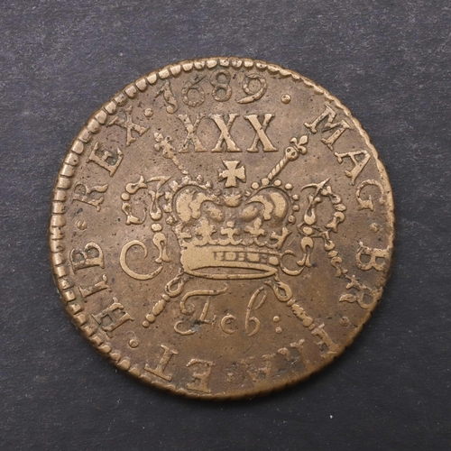 750 - A JAMES II GUNMONEY HALFCROWN, 1689. An Irish James II Gunmoney Halfcrown, February 1689, laureate d... 