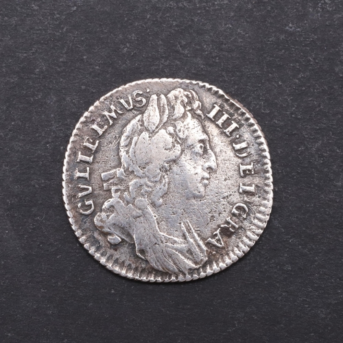 756 - A WILLIAM III SIXPENCE, 1696. A William III Sixpence, first laureate and draped bust r. Reverse cruc... 