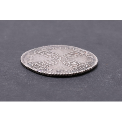 756 - A WILLIAM III SIXPENCE, 1696. A William III Sixpence, first laureate and draped bust r. Reverse cruc... 