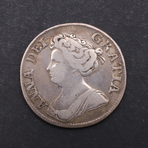 758 - A QUEEN ANNE SHILLING, 1711. A Queen Anne shilling, fourth draped bust l. Reverse with crowned cruci... 