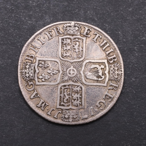 758 - A QUEEN ANNE SHILLING, 1711. A Queen Anne shilling, fourth draped bust l. Reverse with crowned cruci... 