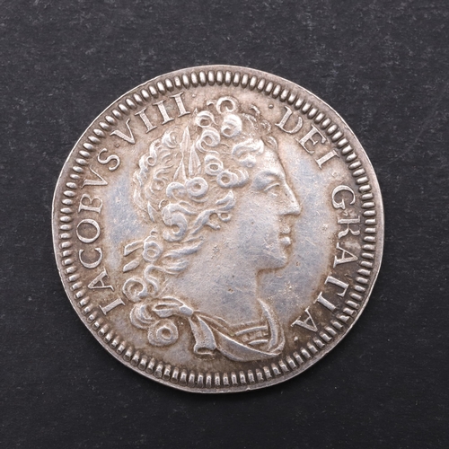 759 - A JAMES VIII OF SCOTLAND SILVER GUINEA (1716) 1828 STRIKE. A James VIII silver guinea, laureate and ... 