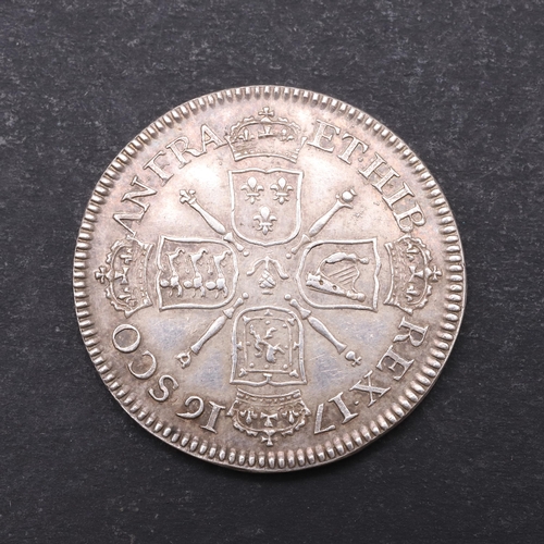 759 - A JAMES VIII OF SCOTLAND SILVER GUINEA (1716) 1828 STRIKE. A James VIII silver guinea, laureate and ... 