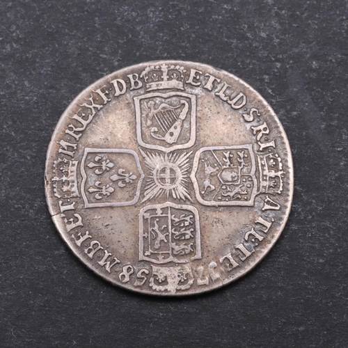 762 - A GEORGE II SHILLING, 1758. A George II Shilling, old laureate and draped bust r. Reverse with plain... 