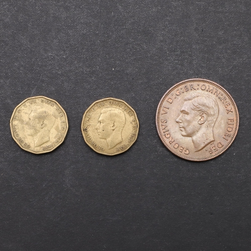 909 - A GEORGE VI PENNY, 1951 AND TWO THREEPENCE 1946. Two George VI Threepence, bare head l. Reverse thri... 