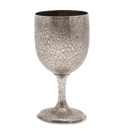 105 - A LATE 19TH/ EARLY 20TH CENTURY INDIAN SILVER GOBLET. of rounded circular form, the whole abundantly... 