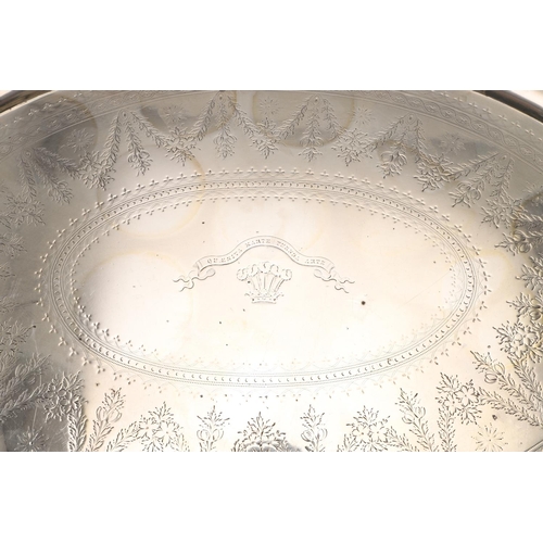 108 - A GEORGE III SILVER TWO-HANDLED TRAY. oval outline, with a gadrooned border, leaf-capped twin handle... 