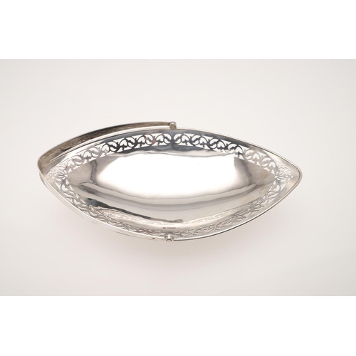 110 - AN EDWARDIAN SILVER SWING-HANDLE BASKET. navette-shaped, with a pierced frieze and raised on a sprea... 