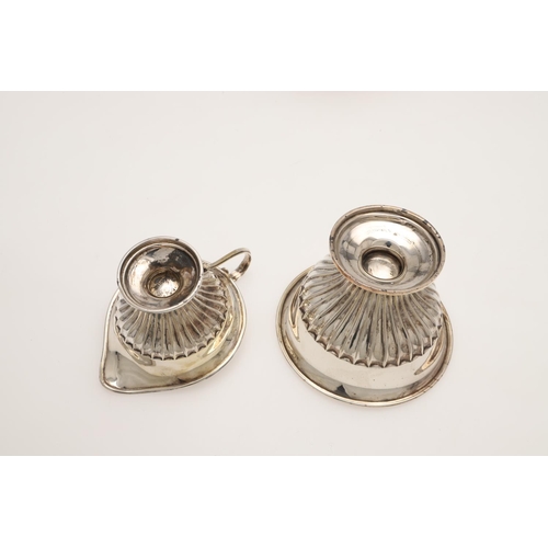 117 - A LATE VICTORIAN BACHELOR'S SILVER TEA SET. circular form, with bats-wing fluted decoration, scroll ... 