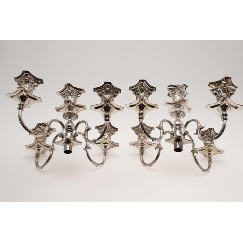 138 - A PAIR OF LATE VICTORIAN SILVER FIVE-LIGHT CANDELABRA BRANCHES. the Corinthian capitals with four sc... 