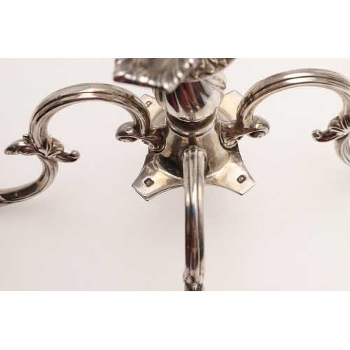 138 - A PAIR OF LATE VICTORIAN SILVER FIVE-LIGHT CANDELABRA BRANCHES. the Corinthian capitals with four sc... 