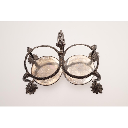 139 - A GEORGE II SILVER OIL & VINEGAR STAND. double circular form, with an 'S'-scroll handle, gadrooned b... 