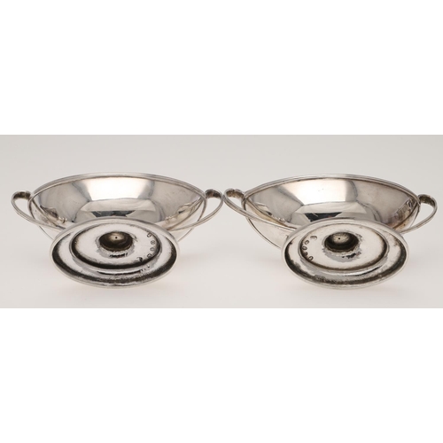 140 - A SET OF FOUR GEORGE III BOAT-SHAPED SILVER SALTS. with twin loop handles, reeded borders, and on a ... 