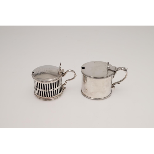 140 - A SET OF FOUR GEORGE III BOAT-SHAPED SILVER SALTS. with twin loop handles, reeded borders, and on a ... 