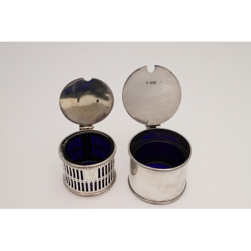 140 - A SET OF FOUR GEORGE III BOAT-SHAPED SILVER SALTS. with twin loop handles, reeded borders, and on a ... 