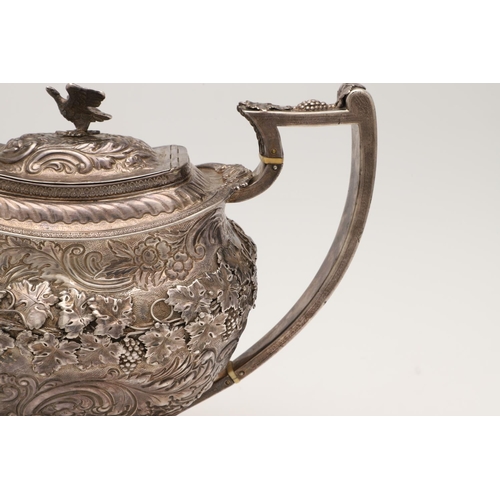 148 - A GEORGE III SILVER COFFEE POT. of a substantial size & gauge, rounded rectangular form, decorated w... 