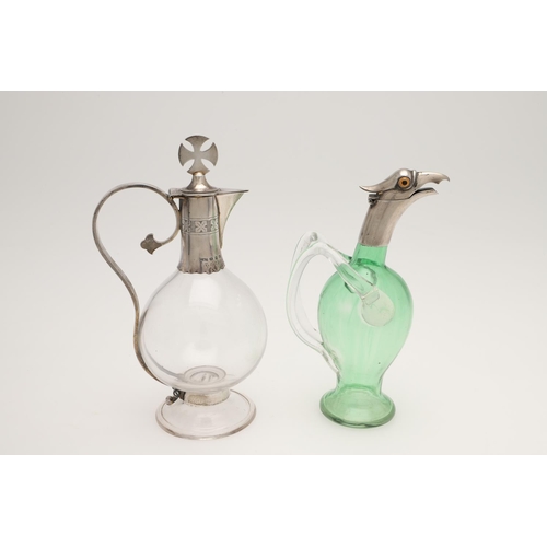 151 - A LATE VICTORIAN SILVER MOUNTED GREEN GLASS NOVELTY LIQUEUR FLASK. modelled with an eagles head, col... 