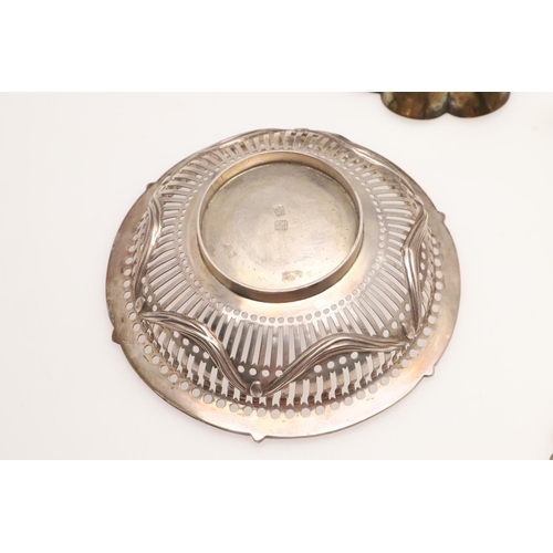 155 - AN EDWARDIAN SILVER BREAD BASKET. of navette outline, with a  punch bead border, pierced sides and e... 